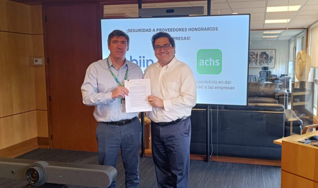 Claudio Dodds CEO biin firma convenio con ACHS